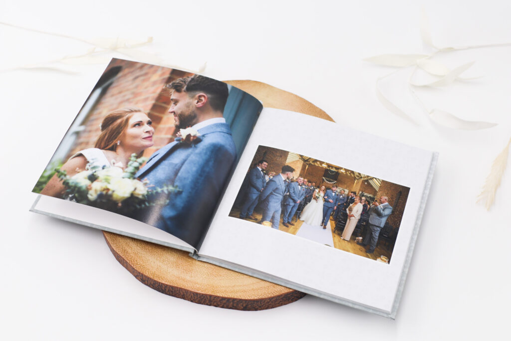 Wedding book open showing wedding pictures