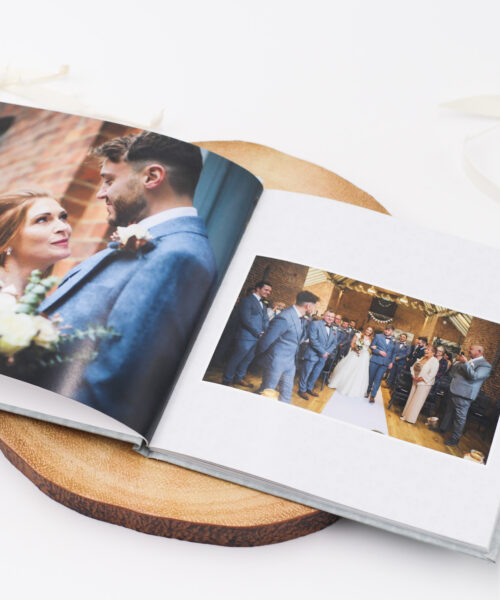 Wedding book open showing wedding pictures